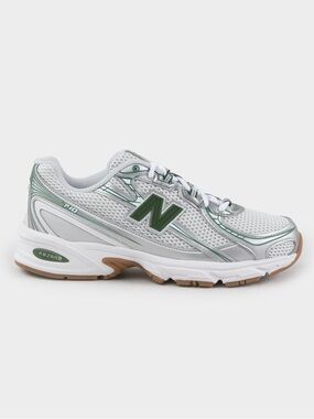New Balance women’s Athletic Runner in White with Green Logo
